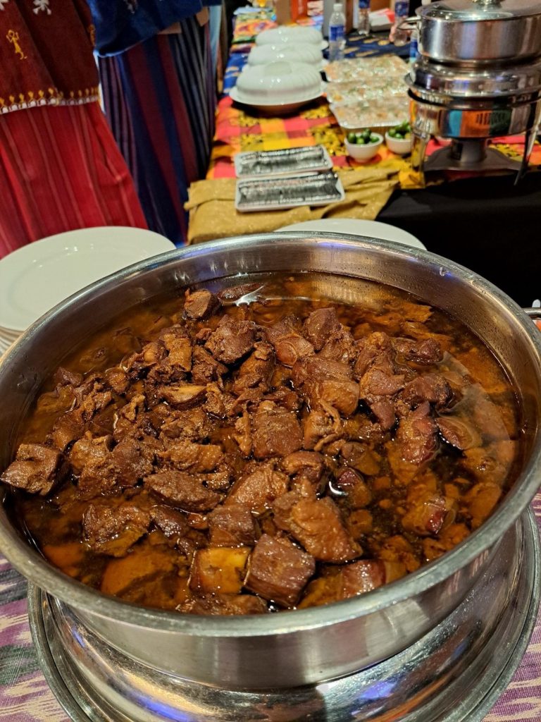 Chicken Adobo prepared by Second Serving offered at the Philippine booth's buffet