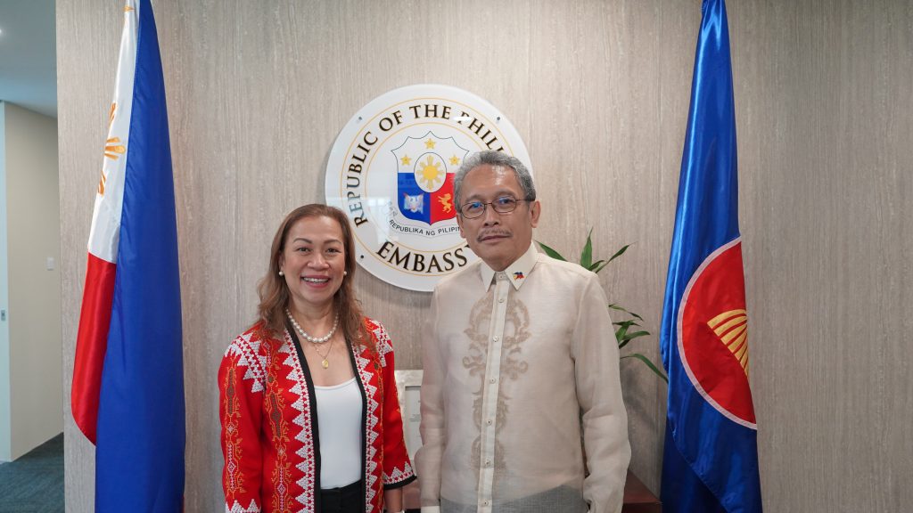 DMW Undersecretary Atty. Maria Anthonette C. Velasco-Allones  together with Ambassador Medardo G. Macaraig