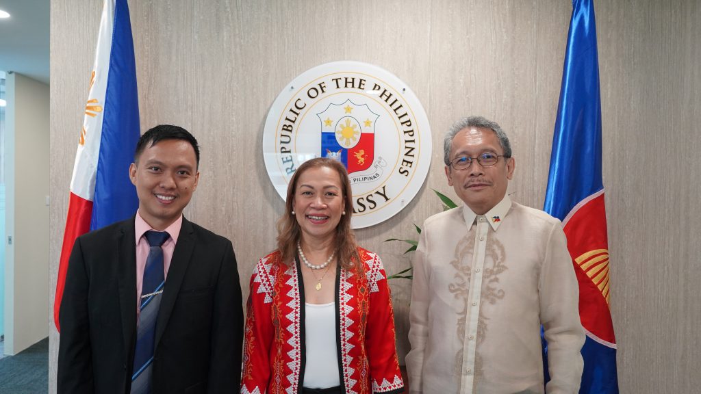 DMW Undersecretary Atty. Maria Anthonette C. Velasco-Allones (center) poses for a photo with Ambassador Medardo G. Macaraig (right) and MWO-Singapore Officer-in-Charge, Assistant Labor Attache Atty. Eduard C. Ferrer (left)