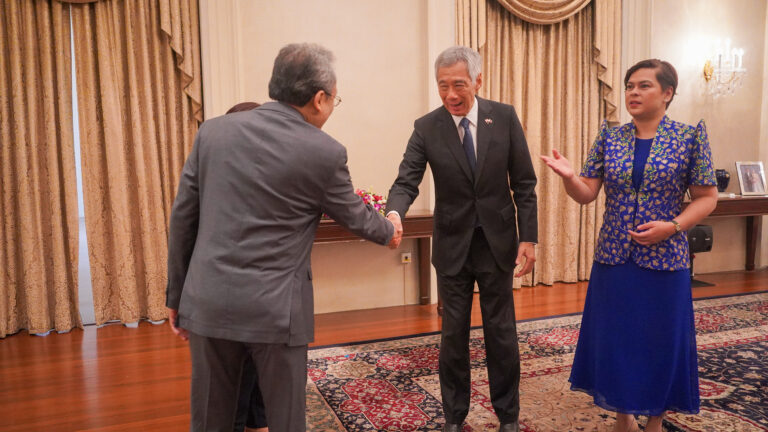 Philippine Ambassador to Singapore Medardo G. Macaraig (left) with Prime Minister Lee and Vice President Duterte.