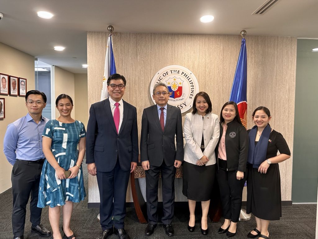 Ambassador Macaraig (center) with the officers of the Philippine Embassy from (L-R): Third Secretary Teddy Edmund Pavon; Third Secretary and Vice Consul Jhullie Anne A. Beniahan, Deputy Head of Mission and Consul General Emmanuel R. Fernandez, First Secretary and Consul Joyleen E. Santos; Third Secretary and Vice Consul Renee Gayle M. Chua; and Third Secretary and Vice Consul Joy Anne B. Lai.