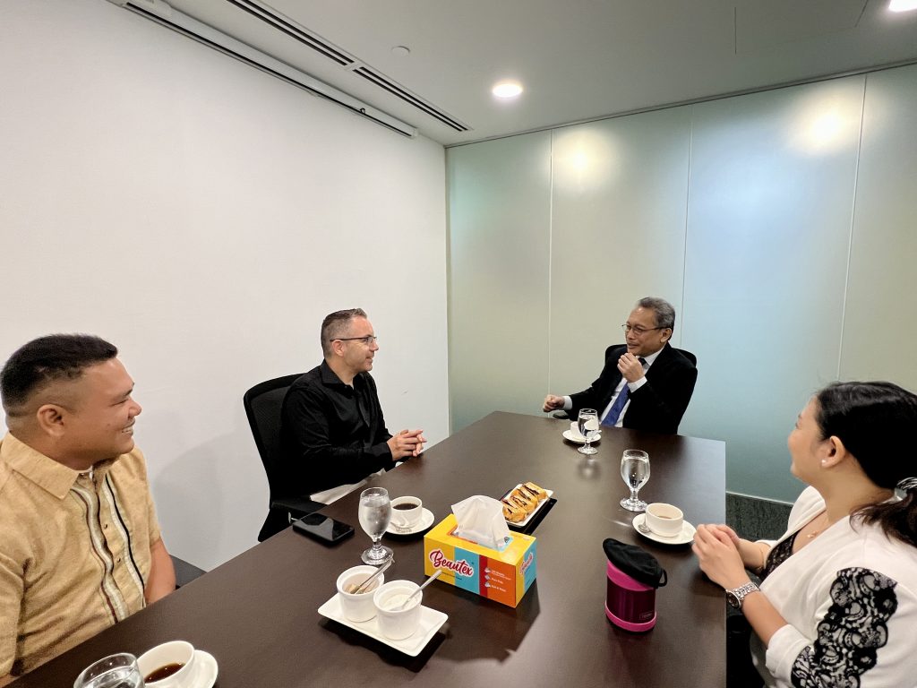 Representatives from the Mandai Wildlife Group discuss conservation efforts with Ambassador Medardo G. Macaraig and extend an invitation to the opening of the Bird Paradise in June.