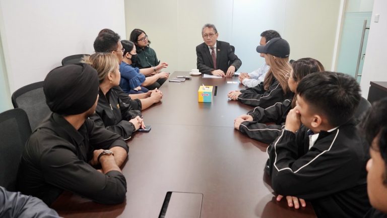Delegation from the Ateneo de Davao University to the Space Entrepreneurship Bootcamp 2023 actively listens to Ambassador Macaraig (Center) during the courtesy call.