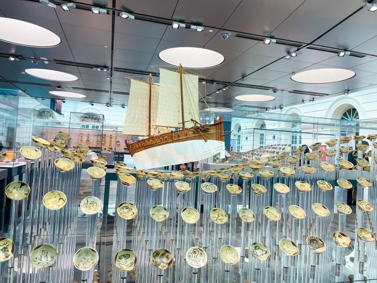 Replica of the “Jewel of Muscat”, a 9th century Arabian ship, with ceramic bowls carefully arranged to resemble cresting waves.